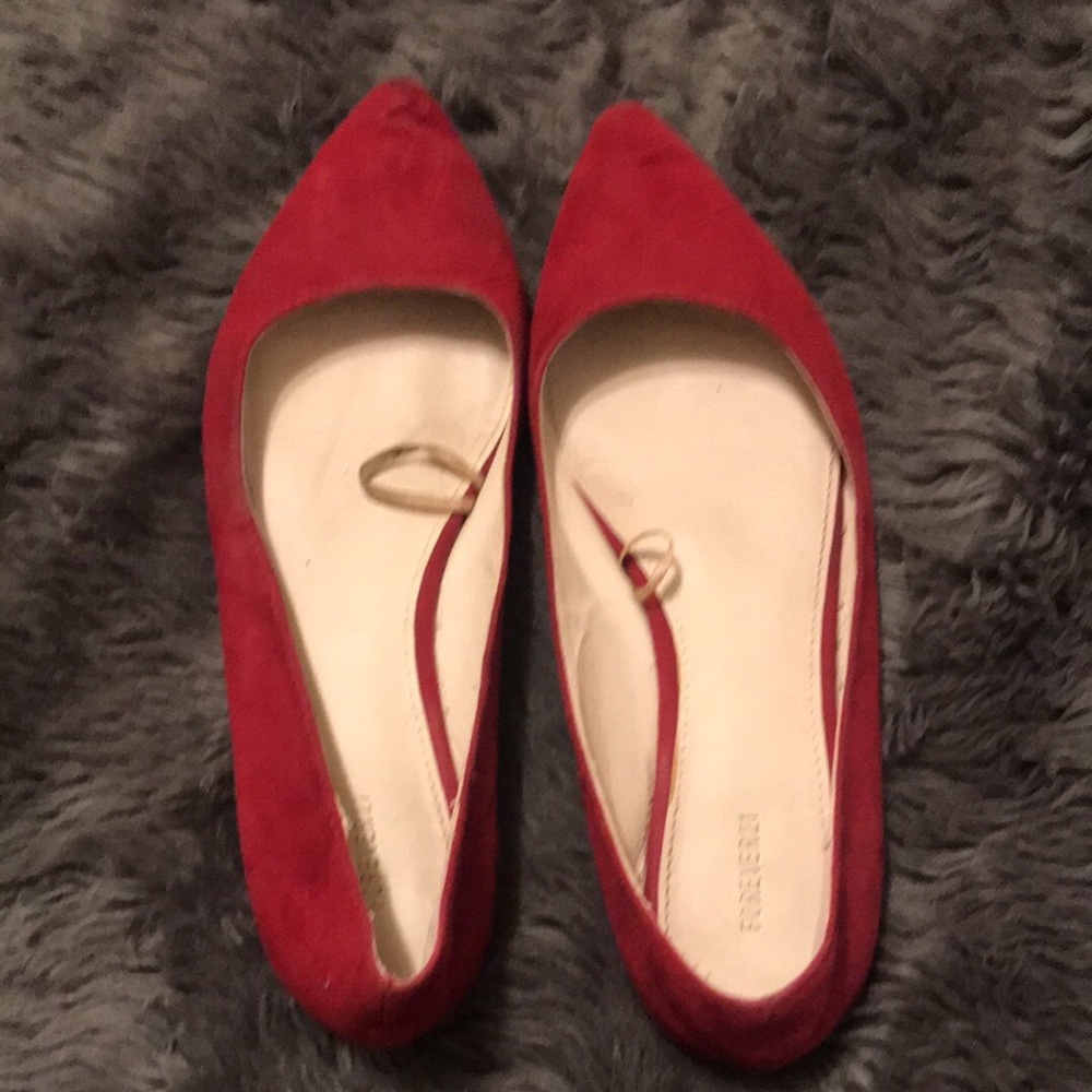 Pointy red shoes